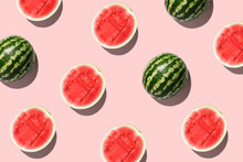 Pattern With Ripe Watermelon On Pink Background. Top View. Copy Space. Pop Art Design, Creative Summer Concept. Half Of Watermelon In Minimal Flat Lay Style