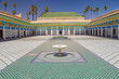 Courtyard at El Bahia Palace, Marrakech, Morocco. In the middle are small white fountains