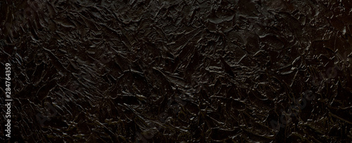 black-texture-background-panorama-in-the-form-of-a-black-textural-background-for-design-and-decoration-embossed-texture-of-a-wide-format