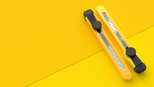 Yellow Cutter On Paper For Background