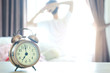 © Photo Sesaon - Morning of a new day, Women wake up from bed. In the morning, she opens the curtains in her bedroom for fresh air and natural morning sunshine.