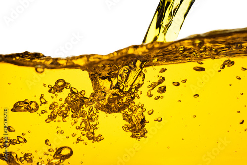 Fotografía Pouring oil car motor gasoline lubricant engine or olive vegetable cooking and b