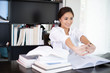 © tuiphotoengineer - Asian woman stretching after reading book and work hard and smiling in the home office