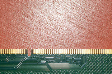 Stick of computer random access memory on orange background 