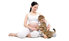 Beautiful Young Pregnant Woman With Son And Cat Isolated On White Background
