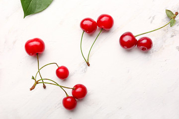 Ripe sweet cherry on white background