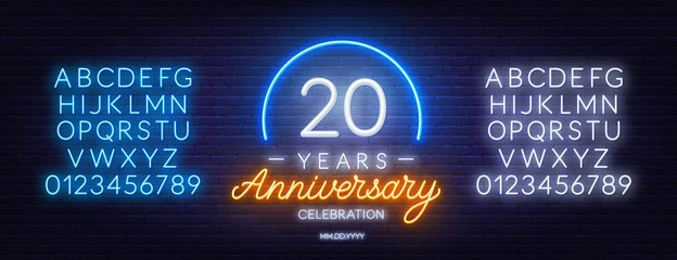 20 anniversary celebration neon sign on dark background. Neon alphabet . Template for invitation or greeting card.