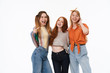 © Drobot Dean - Portrait of three beautiful girls wearing casual clothes smiling and posing at camera together