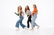 © Drobot Dean - Portrait of three gorgeous girls wearing casual clothes smiling and having fun together