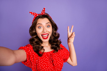 Sticker - Closeup photo of pretty lady making selfies showing v-sign symbol wear red dress isolated purple background