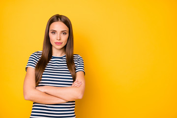 Wall Mural - Close up photo of cool lady with crossed arms company representative wear striped t-shirt isolated yellow background