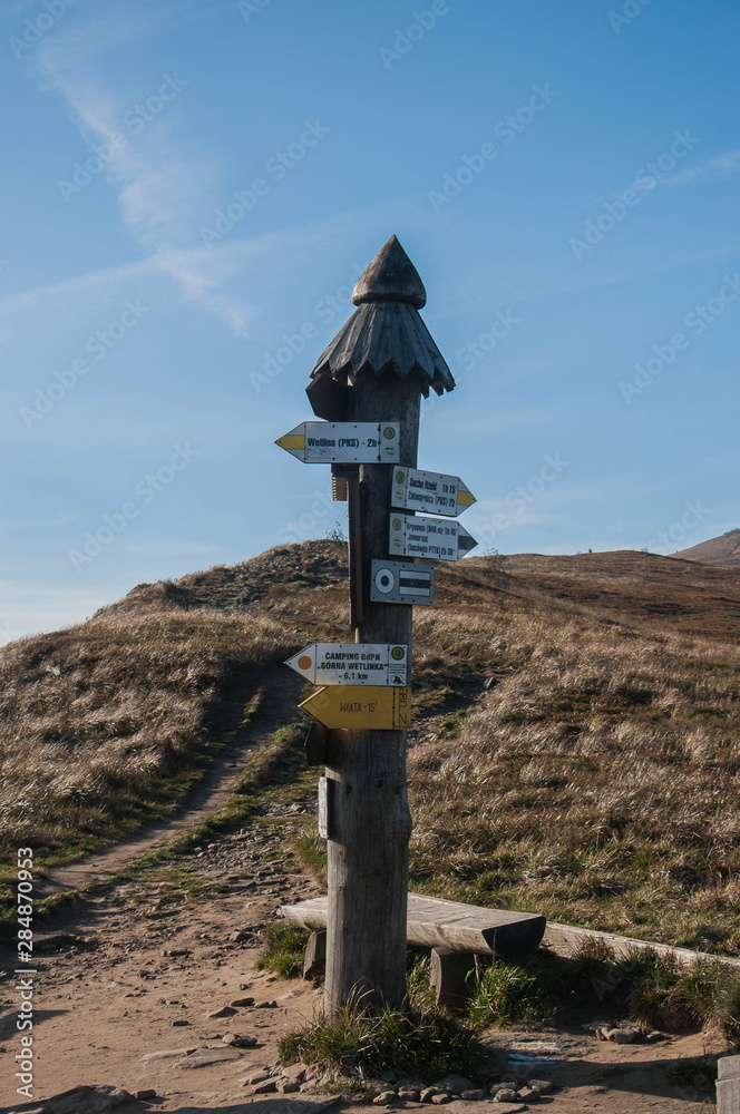 Hiking sign at Bieszczady Mountains in Poland Eastern Carpathians  - obrazy, fototapety, plakaty 