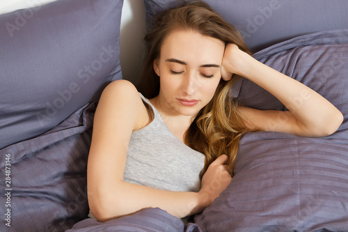 Beautiful Teen Young Woman Basking In Bed In The Morning Beautiful Model Face Looks Sexy In Camera Girl Bedroom Sleep Stock Photo Adobe Stock