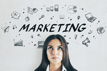 Poster - Attractive european businesswoman with marketing sketch