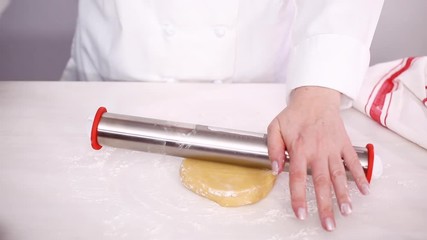 Poster - Step by step. Rolling sugar cookie dough with metal rolling pin.