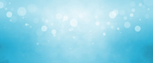 Blue Background With White Bokeh Lights Blurred In The Sky, Sparkling Or Glitter Winter Background Design