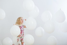 Little Girl With White Balloons Indoor
