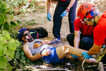 Search And Rescue Team Helping Injured Bicyclist