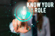 © Artur - Word writing text Know Your Role. Business photo showcasing end acting outside who you actually are Play your position Female human wear formal work suit presenting presentation use smart device