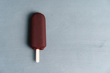 ice cream stick  on dark  background  covered chocolate sticks frozen Popsicle and Lolly sweet dessert  Flat lay