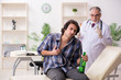 © Elnur - Young male alcoholic visiting old doctor
