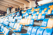 Rows Of Plastic Seats On A Grandstand, Chair In A Stadium, Sitting Area For Spectator