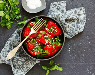 Wall Mural - Baked bell peppers salad with herbs and garlic. Eastern dish.