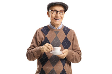 Wall Mural - Cheerful elderly man with a cup of espresso coffee