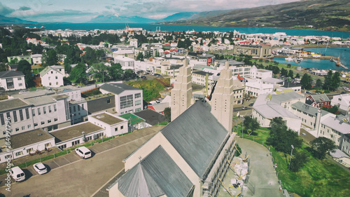 Cuadros en Lienzo Aerial view of Akureyri town in Iceland on a sunny summer afternoon