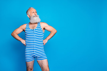 Portrait of his he nice attractive trendy stylish content gray-haired man enjoying leisure spending journey isolated over bright vivid shine turquoise blue green background