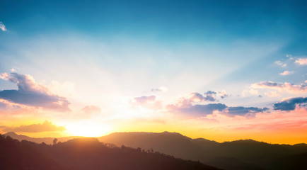 Wall Mural - international mountain day concept: beautiful sky sunset clouds landscape