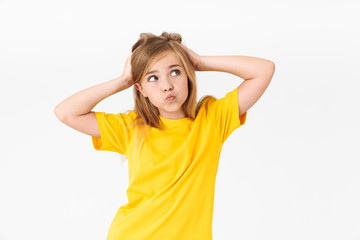 Portrait of little blonde summer girl wearing casual t-shirt looking aside at copyspace