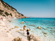 couple at the ocean of Sardinia during vacation in Europe