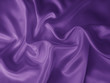 © Sindija - Beautiful smooth elegant wavy violet purple satin silk luxury cloth fabric texture, abstract background design. Card or banner.