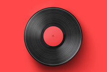 Vinyl Record On A Colored Background. Old Vintage Vinyl Record Isolated