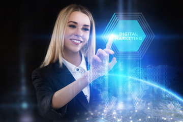 The concept of business, technology, the Internet and the network. A young entrepreneur working on a virtual screen of the future and sees the inscription: Digital Marketing