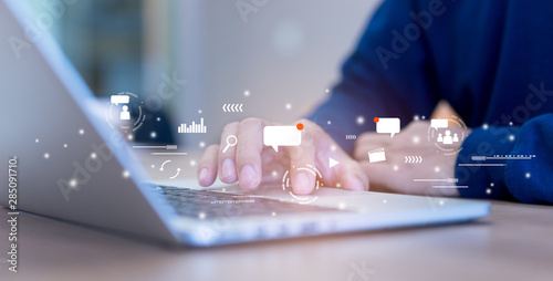 Fotografía close up on man hand using tab pad on laptop to working about futuristic of soci