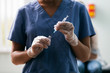 © Sean Locke Photography/Stocksy - Exam: Nurse Fills Syringe With Vaccine