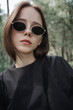© Andrei Aleshyn/Stocksy - portrait of a beautiful girl in sunglasses