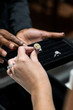 © Sean Locke Photography/Stocksy - Jewelry: Woman Ring Shopping In Upscale Store