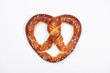 The hand-made pretzel for Octoberfest party on white background