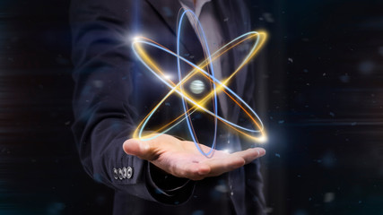 Poster - Hologram of atom on male hand, panorama