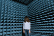 © Hernandez And Sorokina/ADDICTIVE STOCK - Woman in middle of sound room shaking head