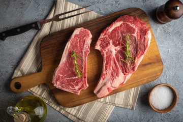 Wall Mural - raw beef steak, new york strip steak and ribeye