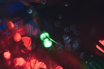 Fototapete - Beautiful green, blue, red bokeh on a shine background.