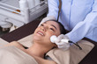© geargodz - woman receiving ultrasound facial beauty treatment skin care