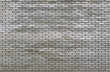 © shchus - Old grey brick wall texture background. Tiled.