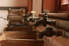 Vintage Antique Laundry Plumbing Taps And Wooden Sinks In An Old Home, Now Museam, In Victoria, Australia