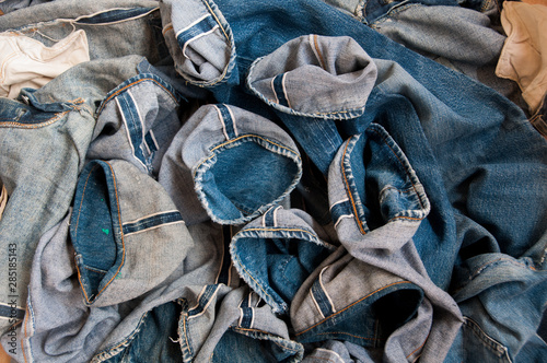 Photographie Old jeans vintage levis Big E blue abstract background