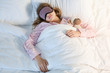 © Pixel-Shot - Teenage girl sleeping in bed at night